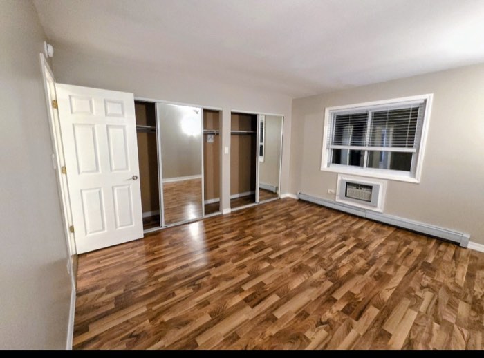 Primary bedroom — closet wall